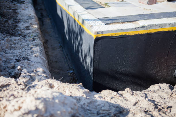 Professional Waterproofing technician working in Cecil, AL
